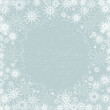 © alma - Winter template with snowflake, snow and empty copy space on colorful background.