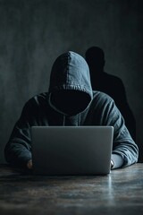 Poster - a laptop with a fake social media login page on the screen, with a dark figure lurking in the backgr