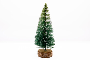 this image showcases a miniature christmas tree with a classic conical shape and lush green foliage,