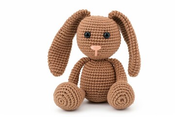 a handmade crochet bunny toy, carefully crafted with soft, neutral-colored yarn, perfect for a baby 