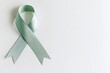 © Gema Vélez - Green ribbon placed on the side of the image. Month of sensitization on brain lesions