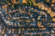Aerial top down view of houses in a residential area in Lichfield, UK during early morning.