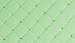 © Westend61 - Green quilted geometric pattern background with a diamond design.
