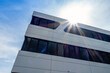 © Westend61 - Modern sustainable office building in Augsburg, Germany with sunlight and lens flare