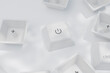 © Westend61 - Closeup of power button on white keyboard keys.