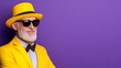 © Trushchenko_O - Man in a yellow suit and hat is smiling and wearing sunglasses