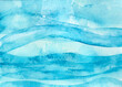 © Westend61 - Blue watercolor waves in an abstract sea/ocean motif on paper.