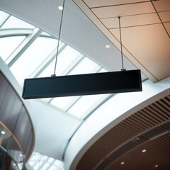 Wall Mural - Black empty signboard suspended from the ceiling in the airport terminal banner mockup advertising blank business display template