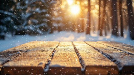 Aufkleber - Golden sunlight casts a warm glow over a vacant wooden table, surrounded by soft falling snowflakes and tall trees. The tranquil winter atmosphere invites peaceful reflection and warmth
