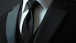 © Atthapon - A man in a suit and tie with a black tie