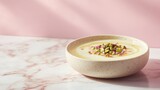 Malabi with Rose Syrup and Crushed Pistachios on Marble Surface