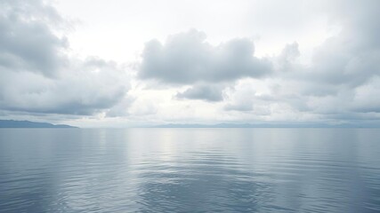 soft grey clouds floating on lake water surface, natural scenery, clouds, water