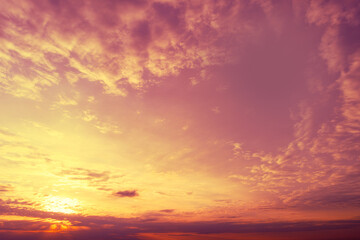 Wall Mural - blazing cloudy sky at sunset. gradient color. sky texture. abstract nature background
