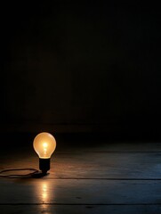 Leinwandbilder - A solitary light bulb glows softly in a dim, empty space, highlighting feelings of abandonment and inviting personal thoughts on isolation. Generative AI