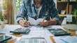 © Сергей Дудиков - A man fills out a tax return