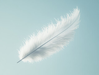 Poster - delicate white feather floats gracefully against soft blue background, evoking sense of tranquility 