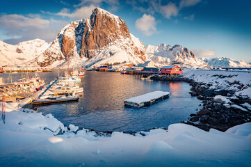 Wall Mural - exciting morning on hamnoy port with festhaeltinden peak on background, norway. snowy winter scene o