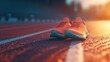 © Анатолий Сав - Brightly colored running shoes sit on a track, illuminated by the warm glow of sunset, inviting runners to hit the pavement. Generative AI