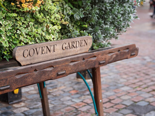 Covent Garden wooden sign on flower stall in London, Uk.