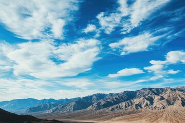Poster - A scenic view of the desert with majestic mountains in the distance