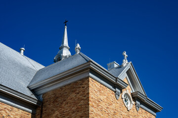 Details of a catholic church on a deep blue sky