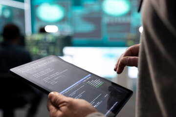 Poster - governmental hackers analyzing big data for cyber threat detection, working at agency desks. profess