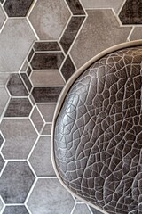 Poster - Close-up view of a leather seat on a motorcycle, suitable for automotive or travel-related uses