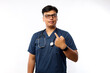 © ArvStd - Nursing assistant in white background pointing with finger at you as if inviting come closer.