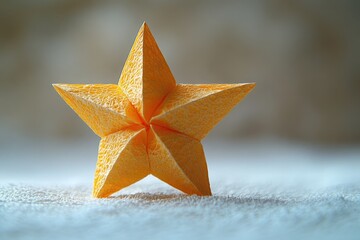 Poster - A single yellow origami star sitting on a white background