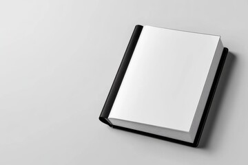 Poster - A clean icon of an ebook reader with a glowing screen, illustrated in sharp black and white contrasts