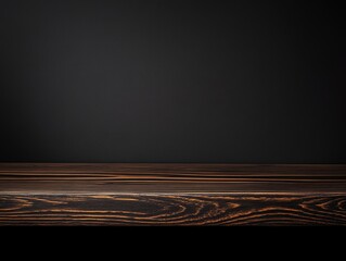Poster - Dark wooden table against a black background.