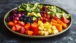 © Hasni - A plate filled with a medley of fresh fruits and veggies perfect for a healthy meal