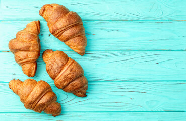 Wall Mural - Group of sweet croissant . French morning breakfast . Top view