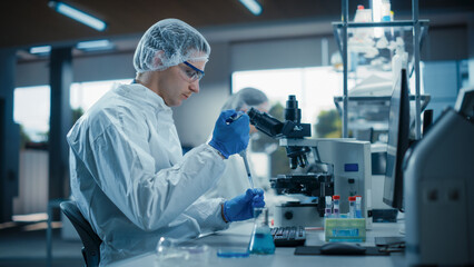 Aufkleber - Medical Scientist Wearing Coveralls and Protective Accessories, Using Micro Pipette while Working with Biological Samples. Sterile Vaccine and Drugs Research and Development in Innovative Laboratory