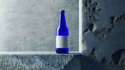 Aufkleber - Vibrant blue beer bottle with a blank white label, set against a minimalist grey background, ideal for creative packaging or branding projects.