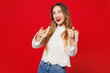 © ViDi Studio - Young confident leader happy Caucasian woman wear white blouse casual clothes point index finger camera on you motivating encourage isolated on plain red background studio portrait. Lifestyle concept.