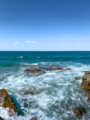 waves crashing on rocks