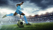 © master1305 - Dynamic image of man, soccer player in blue uniform preparing to kick ball on vibrant green field during intense match. 3D render of stadium. Concept of sport, tournament, competition, game event