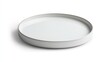 © GenZGraphics - Minimalist empty round plate for main courses isolated on white background top view perfect for restaurant or culinary presentations