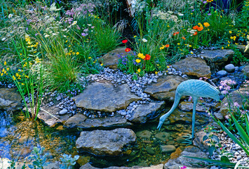 Wall Mural - Coloufrful water feature with rockery