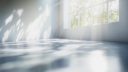 Poster - A window with sunlight shining through it. The room is empty and the sunlight is casting shadows on the floor