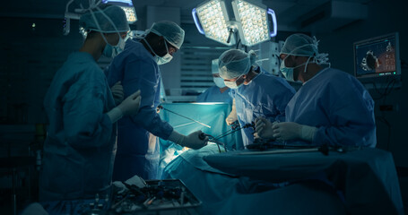 Poster - Medical Team Performing a Complex Surgery on a Patient, Using Specialized Tools, Looking at Digital Screens with Health Information. Doctors with a Female Surgeon in the Lead Saving Patient's Life