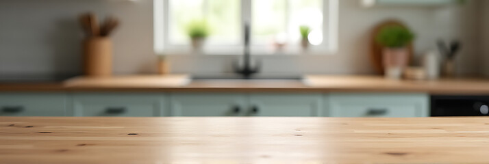 Poster - A wood table top is positioned somewhat obscuring part of a blurred kitchen background with surrounding countertop visible._00001_