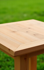 Poster - Beautiful pine wood textured tabletop or counter island is set against a serene green grass lawn background._00001_