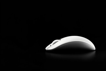 Fototapete - A sleek futuristic mouse rests on a dark surface, showcasing its minimalist design and smooth contours. The focus is on the elegant silhouette and modern style