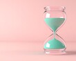 © ali - Clear hourglass with teal green sand on a pastel pink solid background, soft and refreshing theme