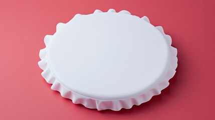 Poster - White bottle cap with ruffled edge on a pink background.