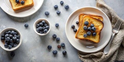 Poster - A Simple Breakfast with Toast and Blueberries Served on White Plates and a Grey Surface