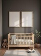 © Murtaza Nauman - dark theme children's room interior, baby bed, two blank wooden edge portrait frames, teddy bear toy, small car, cozy modern design, wooden floor