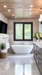 Wall Mural - Spacious bathroom blends elegance with nature, showcasing a freestanding tub beneath large windows that frame lush greenery outside, illuminated by soft overhead lights